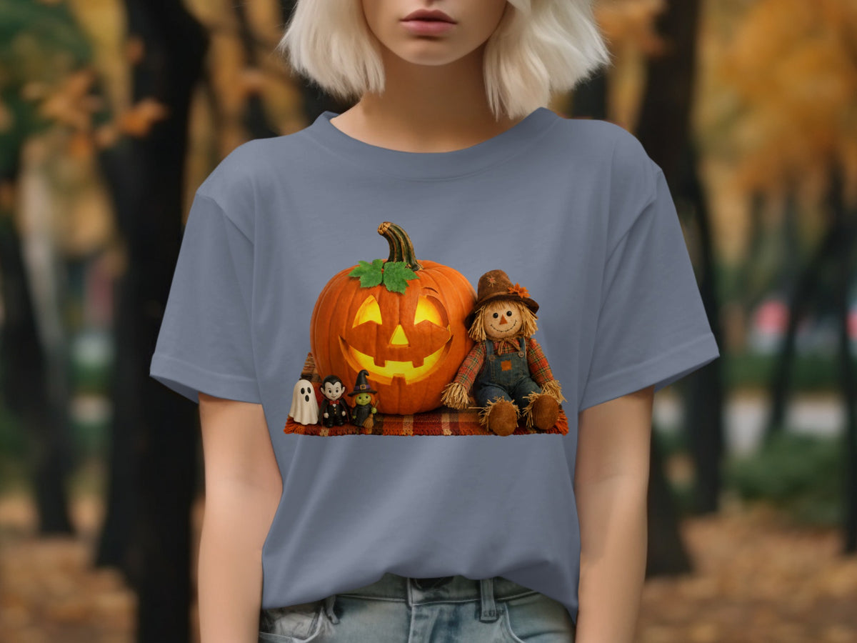 Halloween graphic with pumpkin, scarecrow, witch, vampire, and ghost on a plaid blanket.