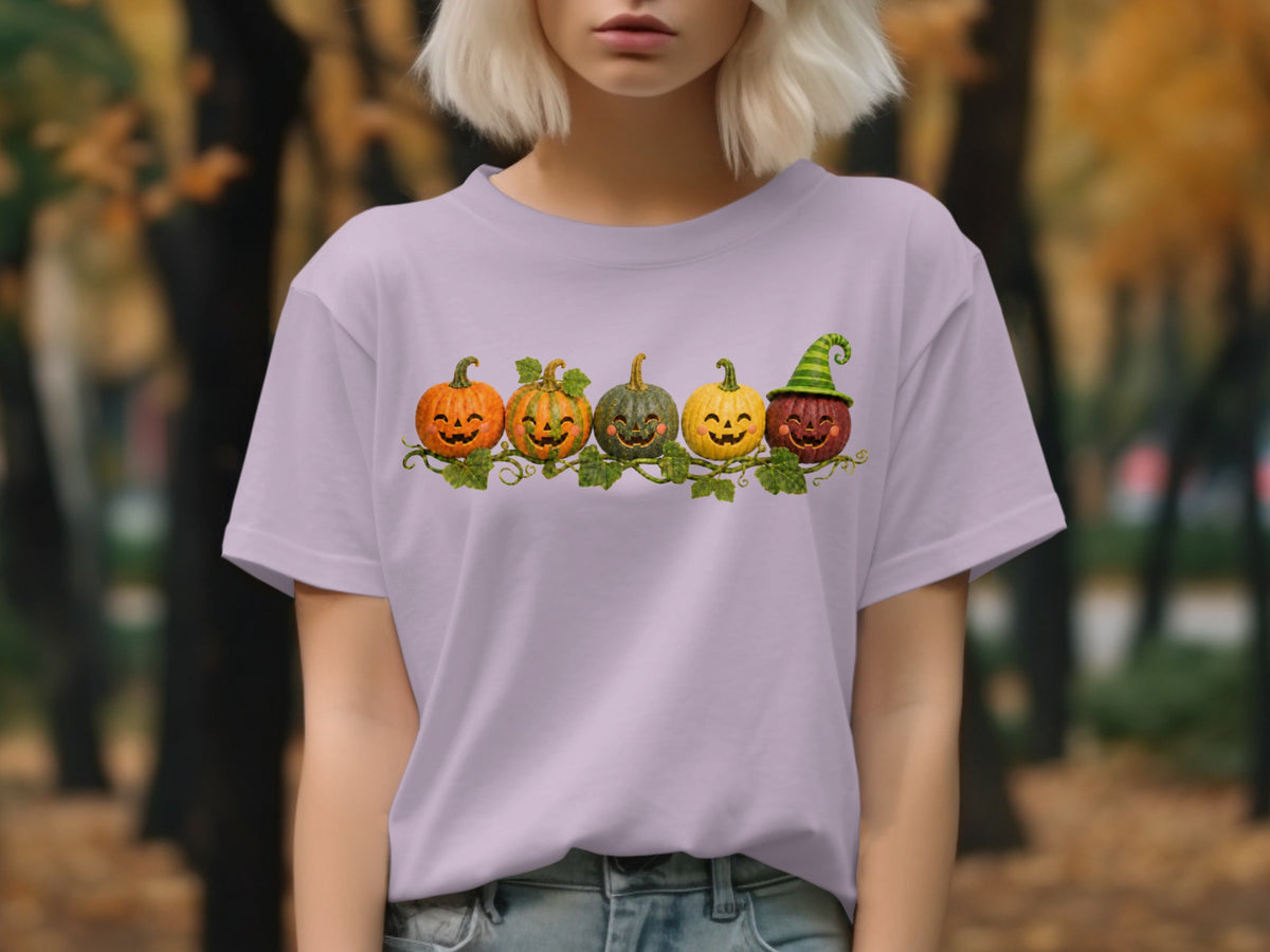 Purple t-shirt with a row of five jack-o'-lanterns and leafy vines.